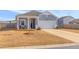 Inviting single-Gathering home with a covered front porch, a garage and landscaping at 454 Pender Woods Dr, Summerville, SC 29486
