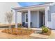 Charming covered front porch with seating area perfect for relaxing outdoors at 454 Pender Woods Dr, Summerville, SC 29486