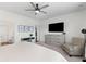 Cozy bedroom featuring neutral walls, light wood floors, and a view to ensuite bath and small study at 454 Pender Woods Dr, Summerville, SC 29486
