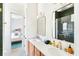 Contemporary bathroom boasting double sinks, modern fixtures, and stylish decor at 74 Sandbar Ln, Folly Beach, SC 29439