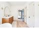 Bright bathroom with double vanity, marble countertop, and modern fixtures at 74 Sandbar Ln, Folly Beach, SC 29439