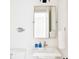 Bright bathroom featuring a modern vanity, toilet, and minimalist decor at 74 Sandbar Ln, Folly Beach, SC 29439