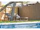 Cozy lounge chairs beside a sparkling pool offer a serene outdoor experience at 74 Sandbar Ln, Folly Beach, SC 29439