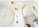 Modern bathroom showcasing a luxurious shower with multiple shower heads, and a glass door at 74 Sandbar Ln, Folly Beach, SC 29439