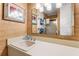Bathroom sink with light above at 807 Treeloft Trce, Seabrook Island, SC 29455