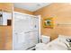 Bathroom featuring straw-colored wallpaper and a glass enclosed shower at 807 Treeloft Trce, Seabrook Island, SC 29455