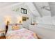 Lofted bedroom with natural light and hardwood floors at 807 Treeloft Trce, Seabrook Island, SC 29455