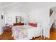 Comfortable bedroom with a floral bedspread and a large dresser at 807 Treeloft Trce, Seabrook Island, SC 29455