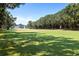 Expansive view of the lush green golf course on a sunny day at 807 Treeloft Trce, Seabrook Island, SC 29455