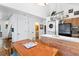 Bright kitchen with modern appliances, wood cabinets, and stacked washer/dryer unit at 807 Treeloft Trce, Seabrook Island, SC 29455