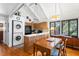 Cozy kitchen with wood cabinets, modern appliances, and adjacent dining area at 807 Treeloft Trce, Seabrook Island, SC 29455