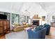 Bright living room with vaulted ceilings, fireplace, and comfortable seating at 807 Treeloft Trce, Seabrook Island, SC 29455