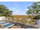 Gorgeous marsh view from deck featuring patio furniture, a railing and two trees at 967 Royall Ave, Mount Pleasant, SC 29464