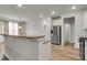 Open kitchen with stainless steel appliances and granite countertops at 9998 Winged Elm St, Ladson, SC 29456