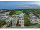 Charming waterfront homes overlooking a golf course, pond, and ocean view at 10 Ocean Point Dr, Isle of Palms, SC 29451