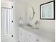 Bathroom featuring an extended vanity, vanity mirror and step-in shower at 10 Ocean Point Dr, Isle of Palms, SC 29451