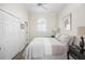 Cozy bedroom featuring neutral color palette and double closets at 10 Ocean Point Dr, Isle of Palms, SC 29451