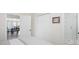 Bright bedroom featuring a double bed, closet, and bathroom with a tiled shower at 10 Ocean Point Dr, Isle of Palms, SC 29451