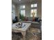 Comfortable living room with plush seating, stylish decor, and large windows for natural light at 10 Ocean Point Dr, Isle of Palms, SC 29451