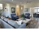 Spacious living room featuring hardwood floors, comfortable seating, and an open floor plan at 10 Ocean Point Dr, Isle of Palms, SC 29451