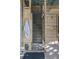 Rustic outdoor shower with wood frame and concrete block wall shows open design at 10 Ocean Point Dr, Isle of Palms, SC 29451
