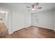 Bedroom with natural light, wood-look floors, ceiling fan, window and closet at 1043 Dominion Dr, Hanahan, SC 29410