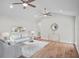 Bright living room with vaulted ceiling, ceiling fans, hardwood floors and stylish furnishings at 1043 Dominion Dr, Hanahan, SC 29410
