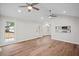 Inviting living room with wood floors, recessed lighting, and a pass-through to the kitchen at 1043 Dominion Dr, Hanahan, SC 29410