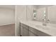 Bathroom featuring vanity with sink and a large mirror at 105 Pen Shell St, Summerville, SC 29485