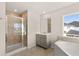 Bathroom featuring a shower with glass door and a vanity with a large mirror at 105 Pen Shell St, Summerville, SC 29485