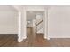 Bright and airy foyer with hardwood floors and a view of the staircase at 105 Pen Shell St, Summerville, SC 29485