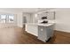 Kitchen features a large island with breakfast bar, modern fixtures, and ample counter space at 105 Pen Shell St, Summerville, SC 29485