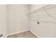 Laundry room with wire shelving and tile flooring at 105 Pen Shell St, Summerville, SC 29485