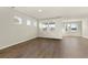 A spacious living room with multiple windows offering plenty of natural light at 105 Pen Shell St, Summerville, SC 29485