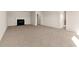 Spacious living room with a cozy fireplace and doorway access to other rooms at 105 Pen Shell St, Summerville, SC 29485