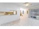 Cozy kitchen featuring tiled floor and a sliding door that opens to the patio at 1075 Quail Dr, Charleston, SC 29412