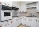 Close-up of the kitchen featuring ample storage and built-in appliances at 1075 Quail Dr, Charleston, SC 29412