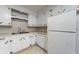 Kitchen featuring ample counter space, white cabinetry, and a practical layout at 1075 Quail Dr, Charleston, SC 29412