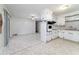 Bright kitchen with a view of the dining area, featuring ample counter space and appliances at 1075 Quail Dr, Charleston, SC 29412