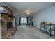 Cozy basement features a brick fireplace, a window for natural light, carpet flooring, and space for equipment at 111 Kennington Dr, Goose Creek, SC 29445