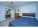 Bedroom featuring a ceiling fan, queen bed, and access to an attached bathroom at 111 Kennington Dr, Goose Creek, SC 29445
