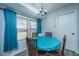 Bright dining area with a table and chairs, accented by vibrant curtains at 111 Kennington Dr, Goose Creek, SC 29445