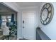 Welcoming entryway featuring a stylish round mirror and a glimpse into the office at 111 Kennington Dr, Goose Creek, SC 29445