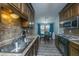 Functional kitchen with modern appliances and a view of the adjacent dining area at 111 Kennington Dr, Goose Creek, SC 29445