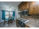 Well-equipped kitchen with stainless steel appliances and ample counter space at 111 Kennington Dr, Goose Creek, SC 29445
