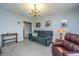 Cozy living room featuring a comfortable sofa and classic furnishings at 111 Kennington Dr, Goose Creek, SC 29445