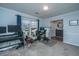 Bright office area with neutral walls, carpet, and a large window providing ample natural light at 111 Kennington Dr, Goose Creek, SC 29445