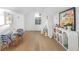Bright bonus room featuring hardwood floors, a stylish table, a decorative teepee, and a contemporary storage unit at 1119 Simmons St, Mount Pleasant, SC 29464