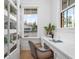 Cozy home office with built-in desk, lots of natural light, and exterior views at 1119 Simmons St, Mount Pleasant, SC 29464