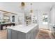 Open kitchen featuring a central island, seamlessly connecting to the living area for easy entertaining at 1119 Simmons St, Mount Pleasant, SC 29464